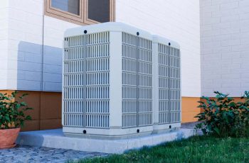 close-up-heat-pump-outside-home close-up-heat-pump-outside-home